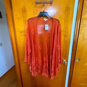 Orange see-thru accent piece.